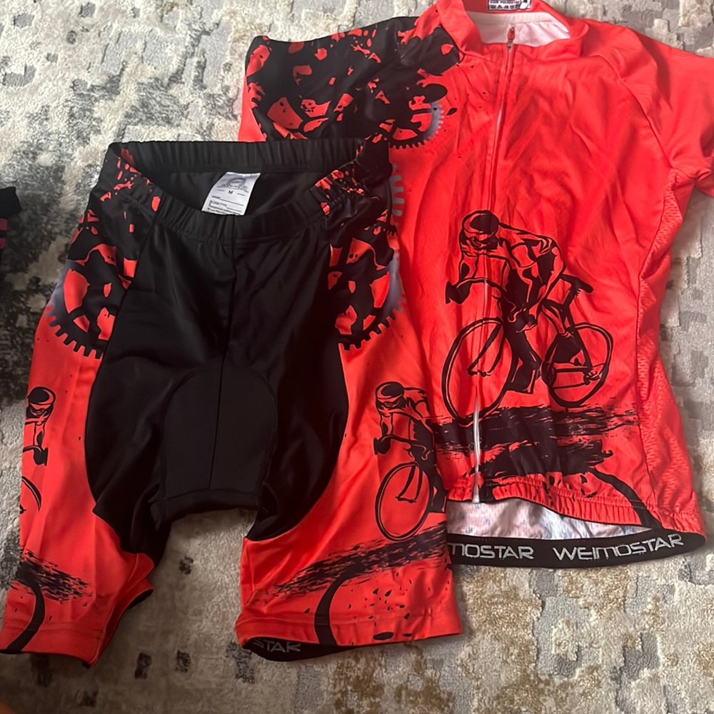 New without tags cycling, bibs and jersey size medium